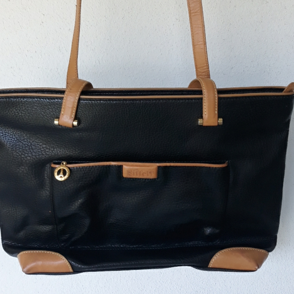 Black leather pocketbook trimmed with tan